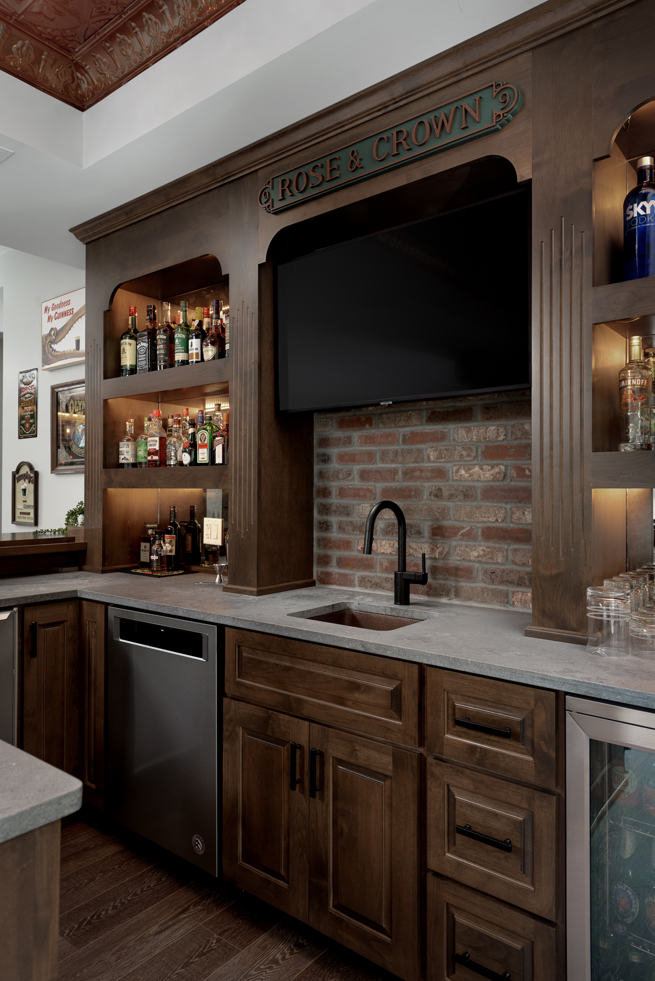 Masculine wood basement bar. Designed by LC Interiors in Naperville, IL.