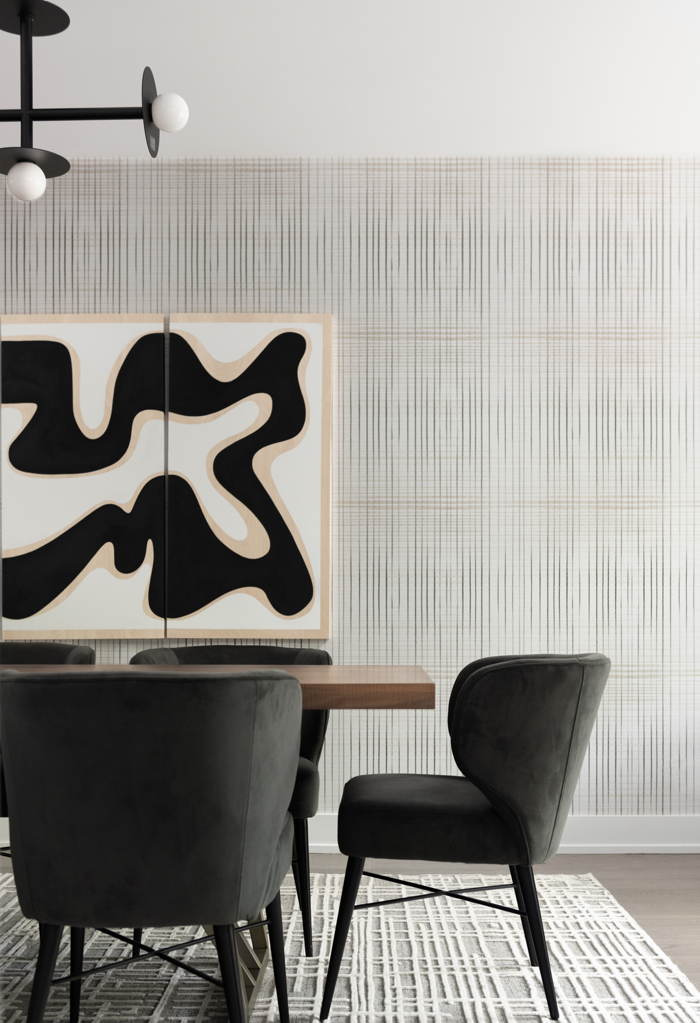 dining room with modern art and wallpaper