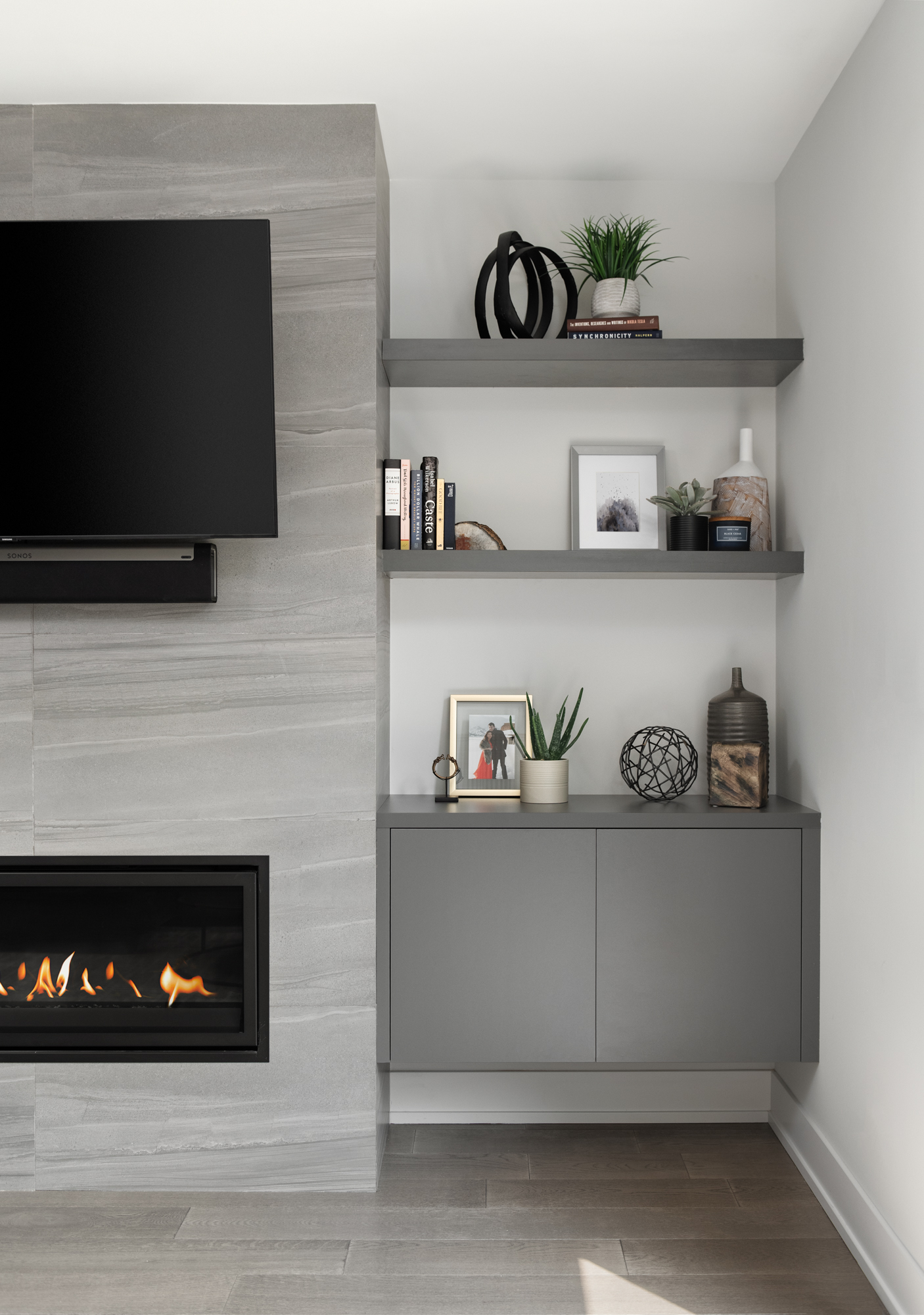 modern gray fireplace and gray cabinets