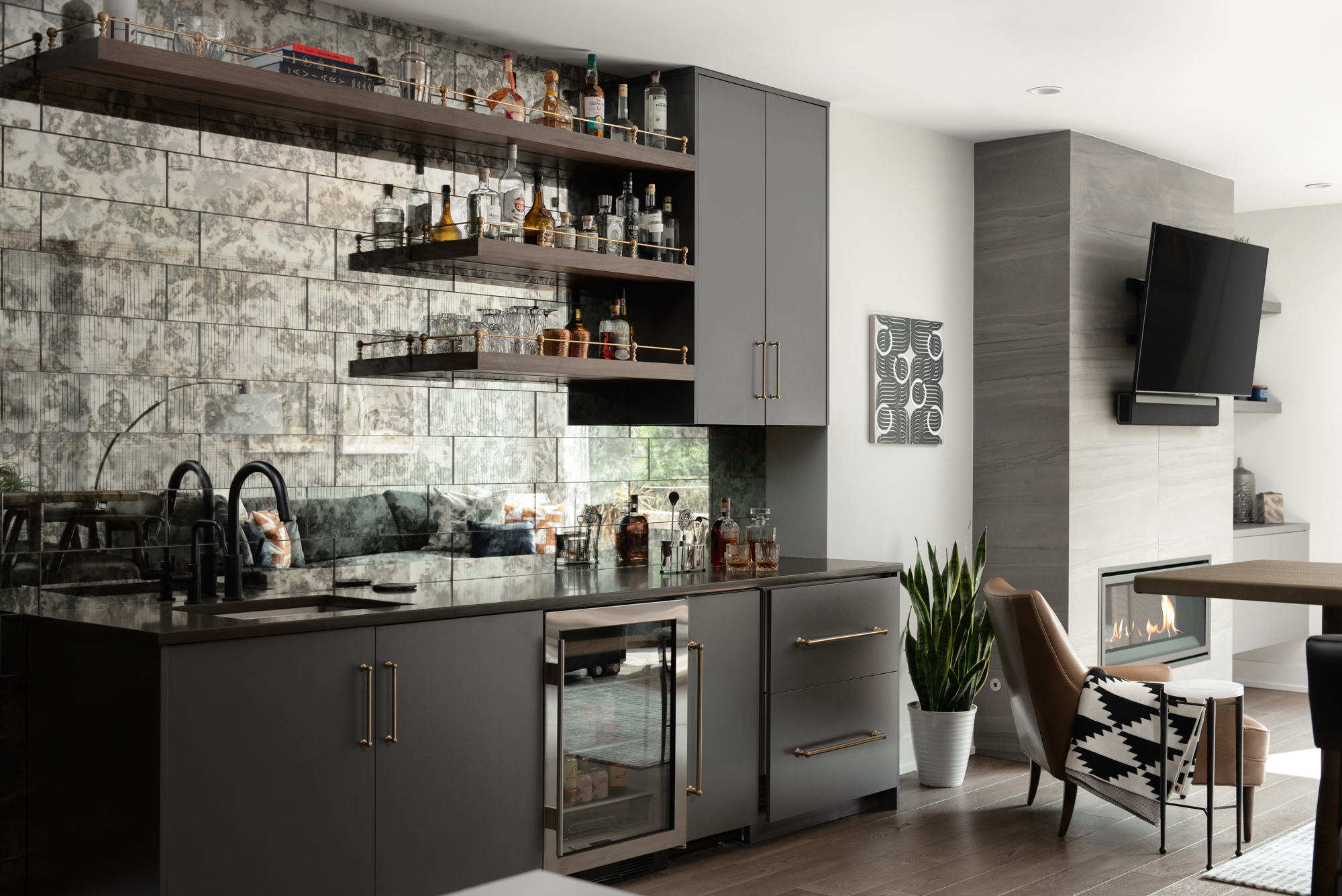 wet bar with gray cabinets